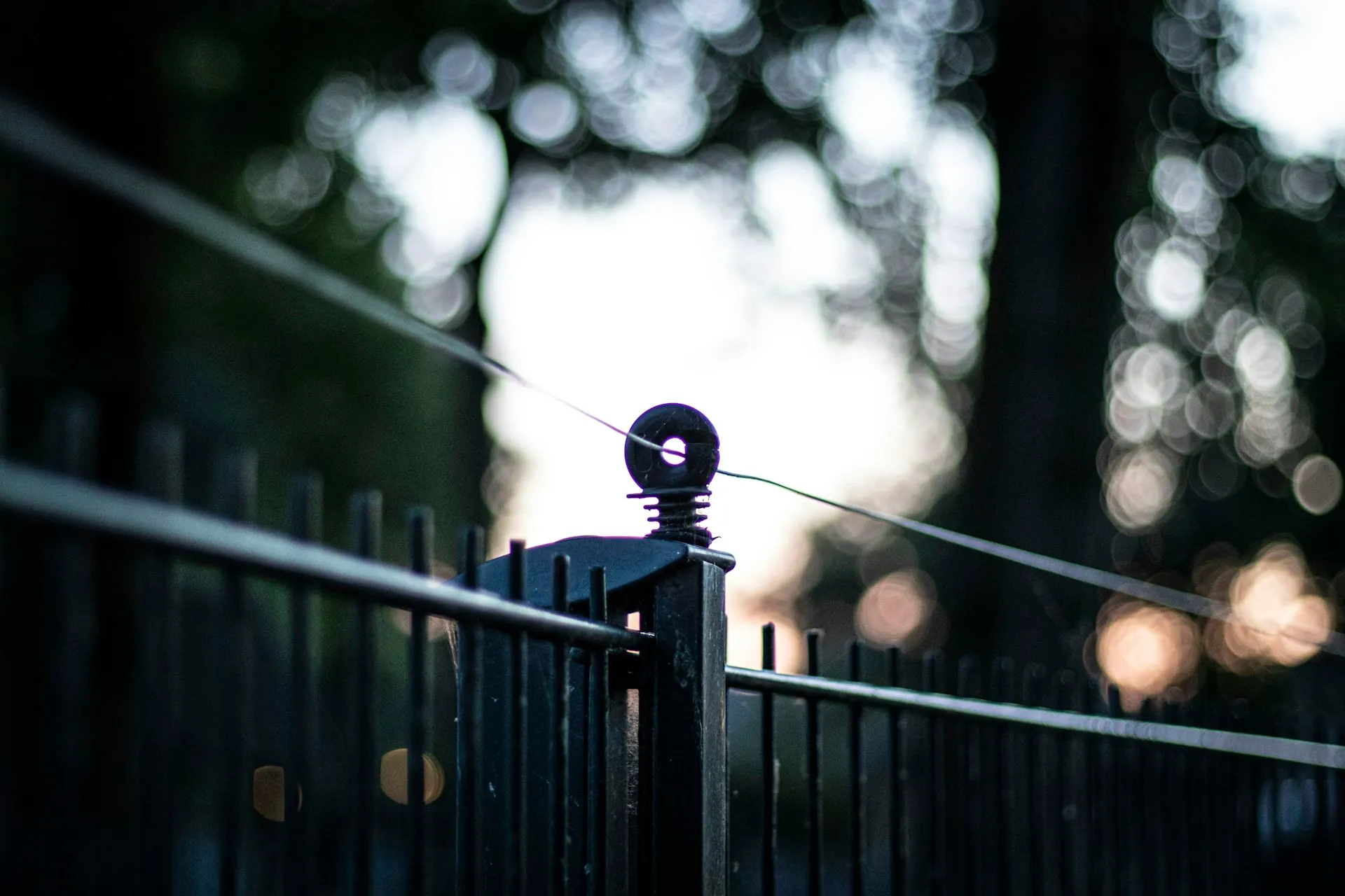 Black ornamental iron fence detail at a Batavia, IL property